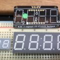 A size comparison: the i2c backback, its mating 4 digit LED display, and the tiny led module the Netapp disk shelves use.