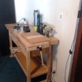 Bought this from Ye Olde Hazard Fraught some time ago.
Its a decent enough workbench, provided you respect its limitations.  (although the drawer slides are both crap, and not replaceable with standard full extension slides without having to re-engineer the entire damn thing.)