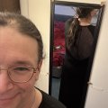 EnFemme had this lovely dress on clearance, with a mesh back that goes down quite a bit. Kitty likes.